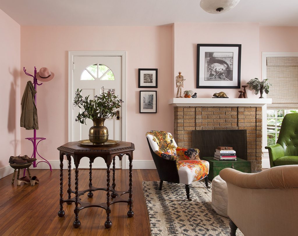 Nostalgia in design with a vintage-inspired pink living room.