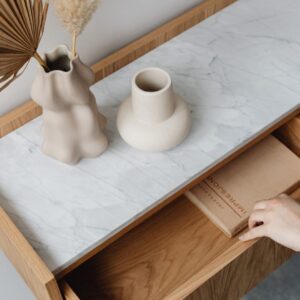Person pulling out a drawer