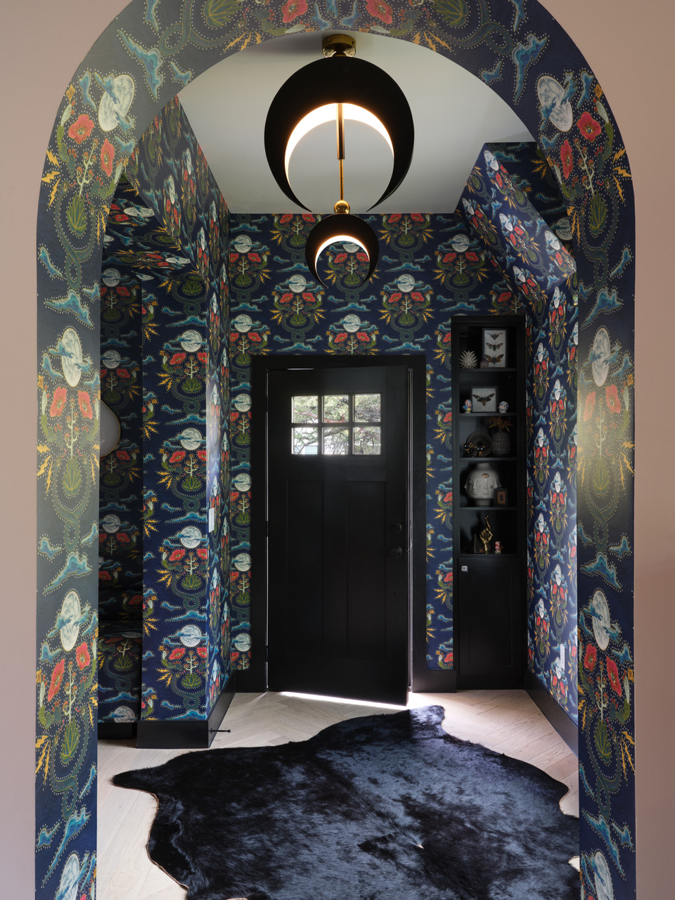 Wallpapered entry way showcasing camp interior design